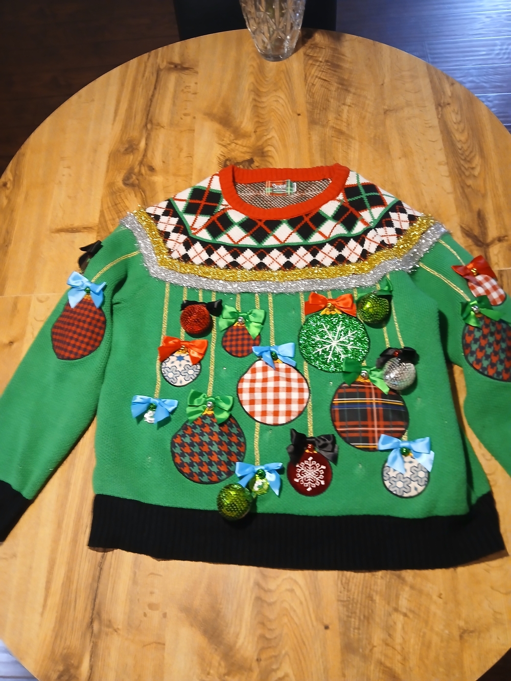 Festive Green Holiday Sweater with Ornament Appliqués